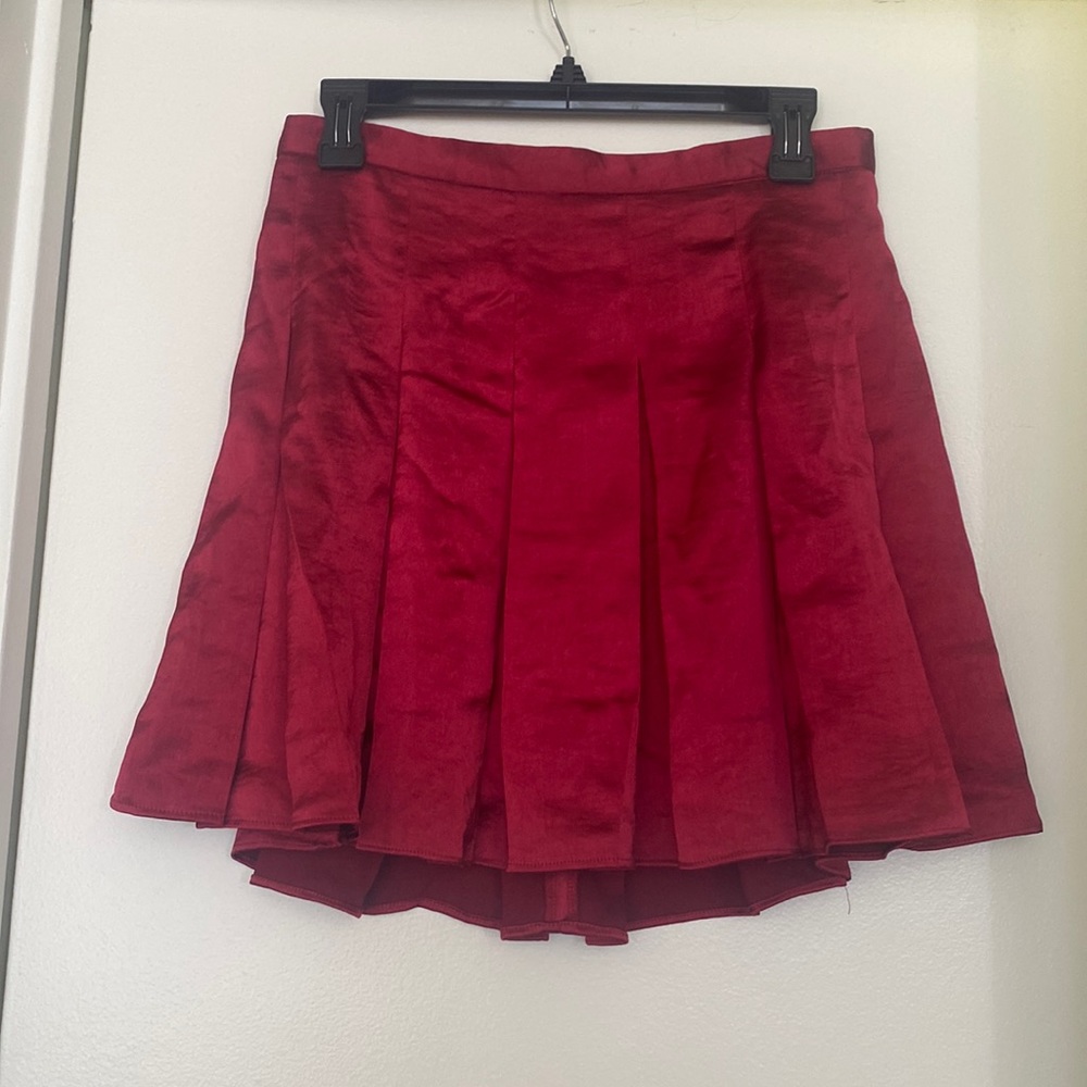 Red pleated skirt